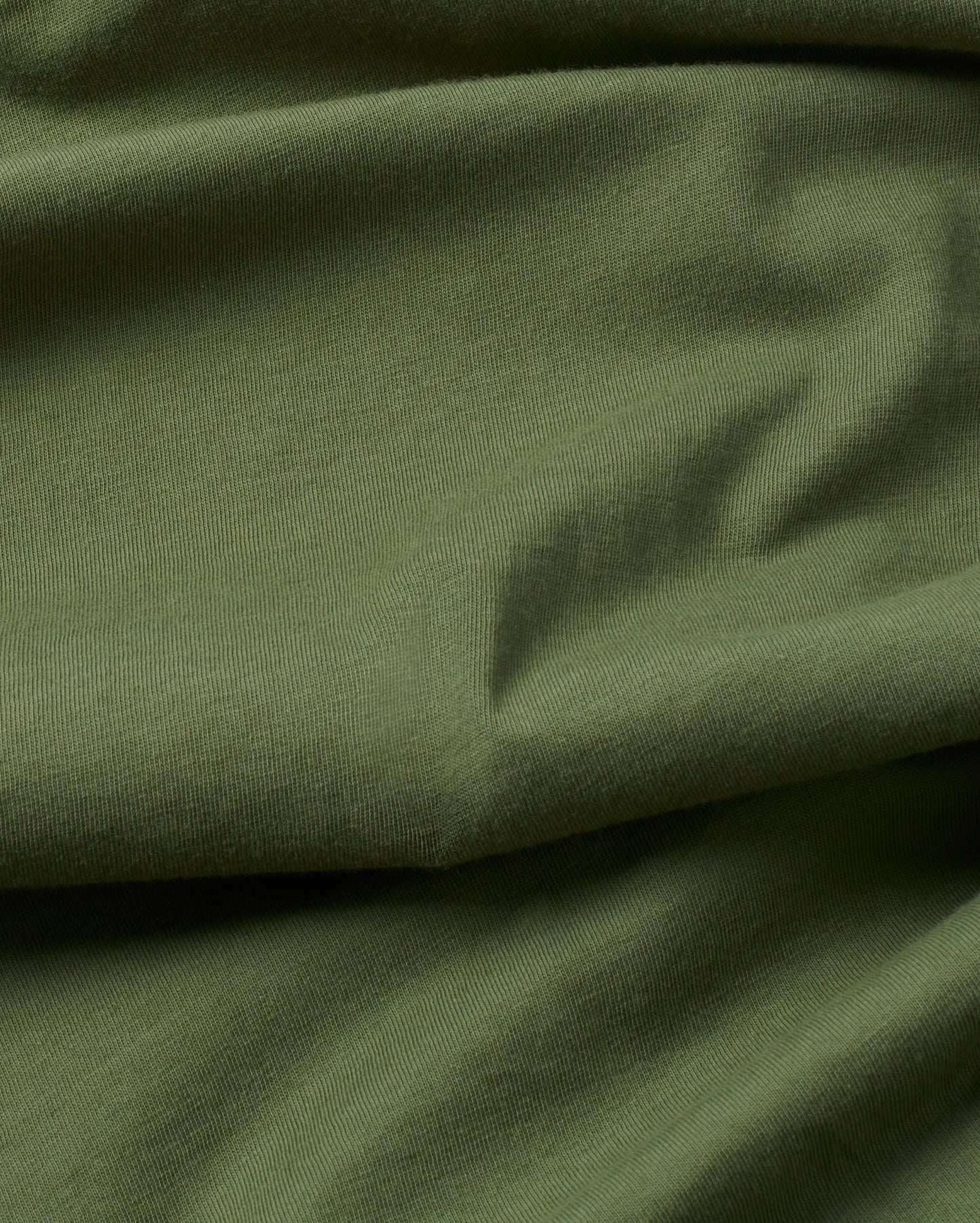 Camiseta verde Here comes the sun sostenible - silueta 2