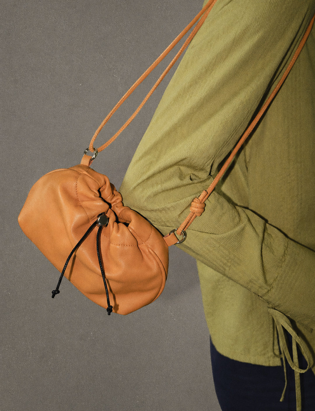 Bolso magnesera naranja piel Grip sostenible silueta - CAMPAÑA