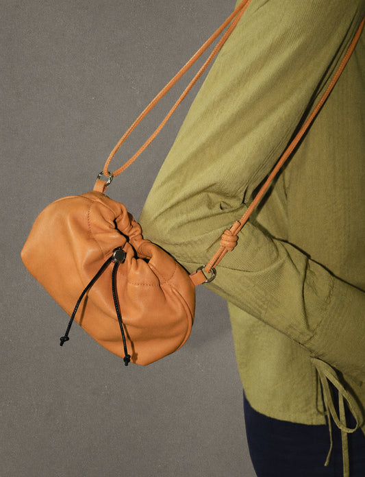 Bolso magnesera naranja piel Grip sostenible silueta - CAMPAÑA