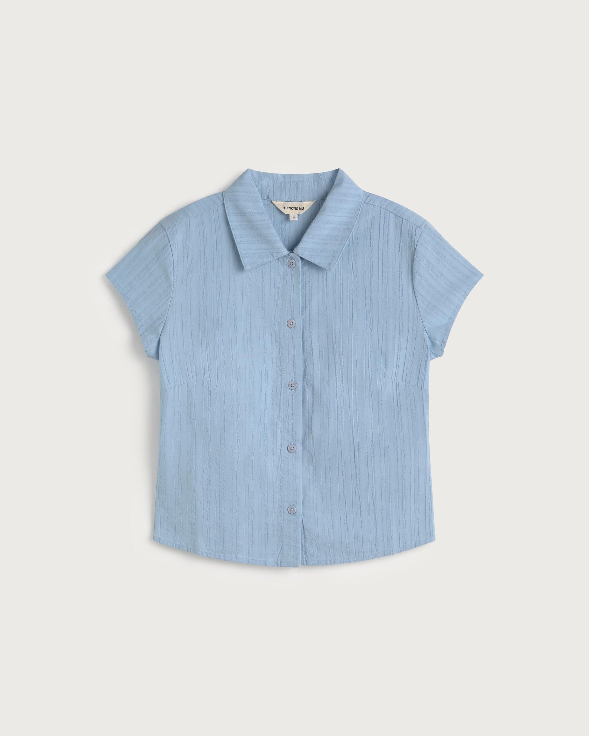 Blusa slim popcorn azul Kitty sostenible silueta - 1